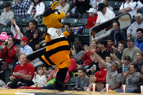 Chris Detrick  |  The Salt Lake Tribune
Bumble the Bee cheers during the game at Spring Mobile Ballpark Thursday April 4, 2013.