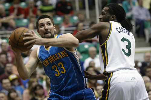 Chris Detrick  |  The Salt Lake Tribune
Utah Jazz small forward DeMarre Carroll (3) guards New Orleans Hornets power forward Ryan Anderson (33) during the game at EnergySolutions Arena Friday April 5, 2013. Utah is winning the game 45-43 at halftime.