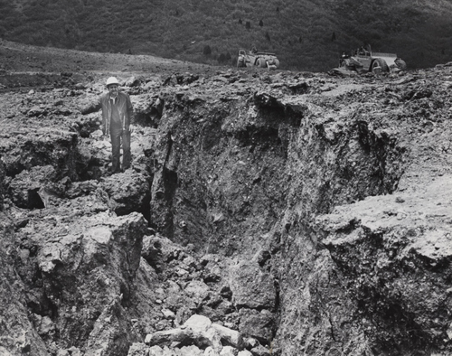 (Salt Lake Tribune archives)
Alton Frazier, a Utah official, explores cracks on the toe of the Thistle landslide in April 1983.