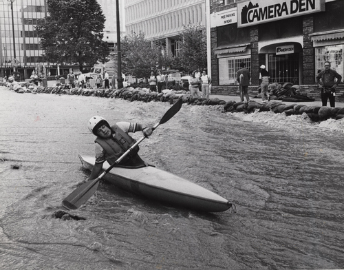 (Salt Lake Tribune archives)
East High School student Michael C. Giddings navigates the upper headwaters of State Street during flooding in 1983.