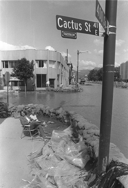 Al Hartmann  |  The Salt Lake Tribune

Unidentified women try fishing in a temporary river along 400 South just off State Street in downtown Salt Lake City in late May 1983 during massive flooding.