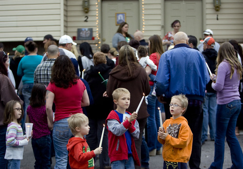 Kim Raff  |  The Salt Lake Tribune
Family and friends of 5-month-old Ryker Petersen gather for a candlelight vigil in American Fork on April 7, 2013. Police say Ryker was shot to death on Friday by his father, Joshua Petersen.