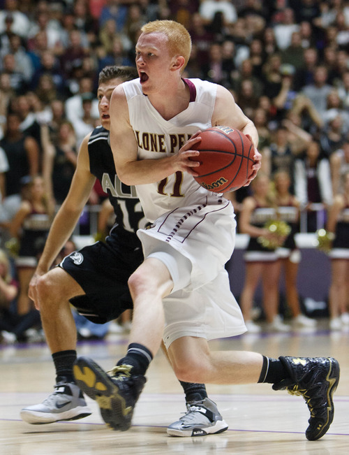 Trent Nelson  |  The Salt Lake Tribune
Lone Peak's TJ Haws drives to the basket as Lone Peak beats Alta High School in the 5A basketball state championship game Saturday, March 2, 2013 in Ogden.