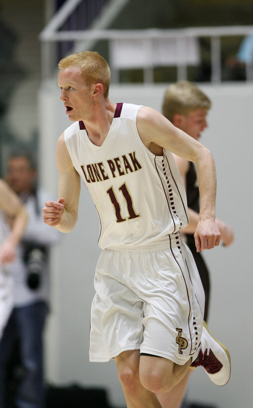 Steve Griffin | The Salt Lake Tribune


Lone Peak's T.J. Haws heads up court after nailing a three pointer during 5A state basketball game against Davis at the Dee Events Center in Ogden, Utah Wednesday February 27, 2013.