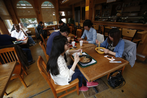 Francisco Kjolseth  |  The Salt Lake Tribune
Patrons enjoy the good food and cozy atmosphere of the back room at KoKo Kitchen, 702 S. 300 E. in Salt Lake City recently.