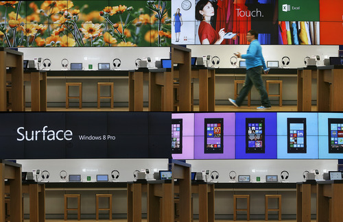 Scott Sommerdorf   |  The Salt Lake Tribune
A panel of four photos showing the changing display wall at the new Microsoft Store at the City Creek Center in downtown Salt Lake City, Wednesday, April 10, 2013.