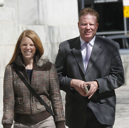 Al Hartmann  |  The Salt Lake Tribune
Jeremy Johnson and wife Sharla smile after leaving Federal Court in Salt Lake City Wednesday April 10, 2013, for his initial appearance on an indictment on conspiracy, fraud and money laundering in connection to his I Works company.