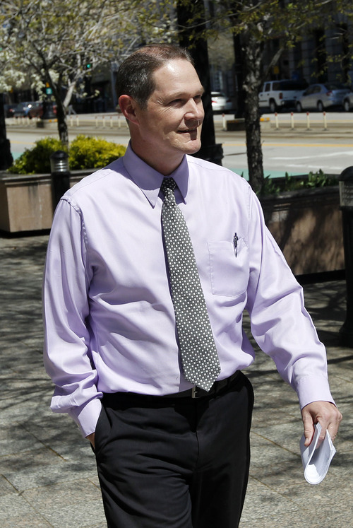 Al Hartmann  |  The Salt Lake Tribune
Loyd Johnston leaves Federal Court in Salt Lake City Wednesday April 10, 2013, after his initial appearance on an indictment on conspiracy, fraud and money laundering in connection to the I Works company.