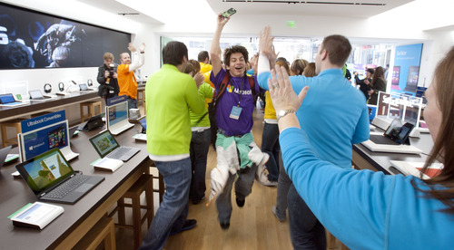 Steve Griffin | The Salt Lake Tribune

Customers are greeted by Microsoft Store employees during grand opening of its first Microsoft Store at the City Creek Center in Salt Lake City, Utah Thursday April 11, 2013.