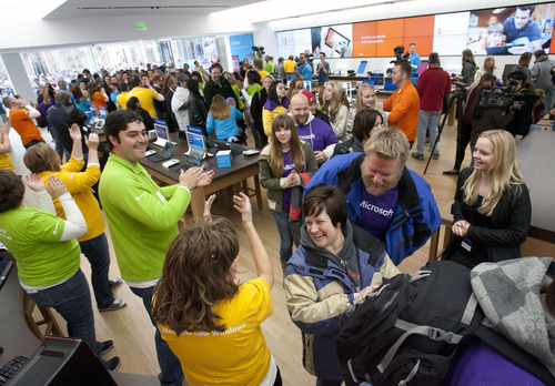 Steve Griffin | The Salt Lake Tribune

Customers are greeted by Microsoft Store employees during grand opening of its first Microsoft Store at the City Creek Center in Salt Lake City, Utah Thursday April 11, 2013.