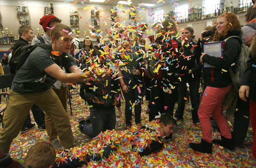 Rick Egan  |  The Salt Lake Tribune 
American Fork High School band students celebrate after hearing the announcement that they have been invited to perform at the 2014 Macy's Thanksgiving Day Parade.