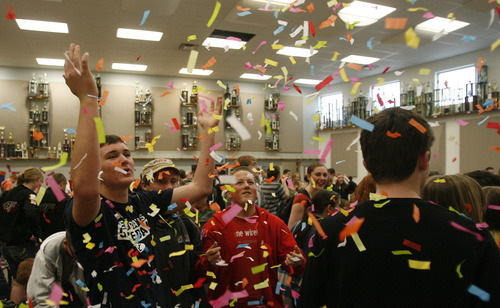 Rick Egan  |  The Salt Lake Tribune 
American Fork High School band students celebrate Thursday April 11, 2013, after hearing the announcement that they have been invited to perform at the 2014 Macy's Thanksgiving Day Parade.