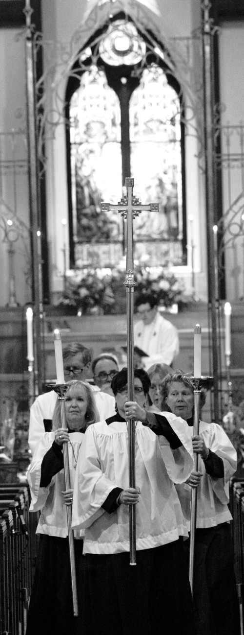 Steve Griffin | The Salt Lake Tribune

The cross is carried out of the chapel at the conclusion of a special prayer service for victims and all those affected by the Boston marathon bombs, at The Cathedral Church of Saint Mark in Salt Lake City, Utah Tuesday April 16, 2013. The church bell rang for once for every known victim in the bombings and once more for any unknown victims.