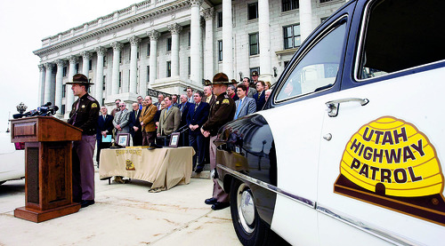 Al Hartmann  |  The Salt Lake Tribune   3/2/10
Colonel Daniel Fuhr of the Utah Highway Patrol, left, speaks on the steps of the state capitol during a 2010 event commemorating the patrol's 75th year.