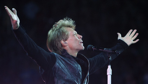 Steve Griffin | The Salt Lake Tribune

Jon Bon Jovi embraces the crowd as they sing with Bon Jovi in concert at EnergySolutions Arena in Salt Lake City, Utah Wednesday April 17, 2013.