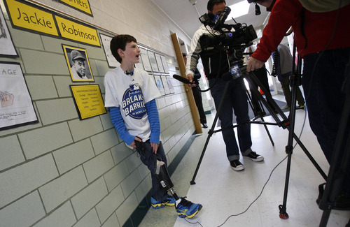 Francisco Kjolseth  |  The Salt Lake Tribune
Steven Blodgett, 11, a 5th grader at Morningside Elementary in Salt Lake shows off his prosthetic which he now wears after his leg was amputated during his battle with bone cancer. Steven who recounted his battle in an essay won a contest that led to a meeting with late Hall of Famer Jackie Robinson's daughter.