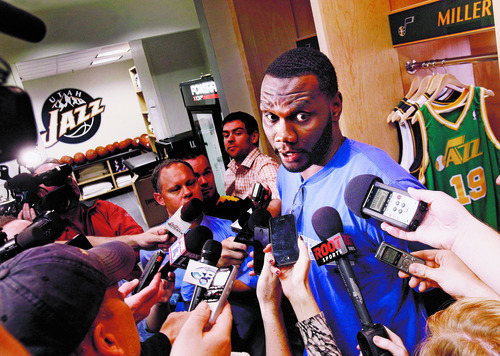 Scott Sommerdorf   |  The Salt Lake Tribune
Al Jefferson answers questions for a swarm of reporters in teh Jazz locker room. After losing in Memphis, and missing the playoffs, the Utah Jazz cleaned out their lockers and met with the press, Thursday, April 18, 2013.