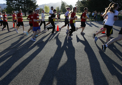 Scott Sommerdorf | Tribune file photo
Runners in the half-marathon enter Sugarhouse Park at about the four-mile mark in the Salt Lake City Marathon, Saturday, April 21, 2012.