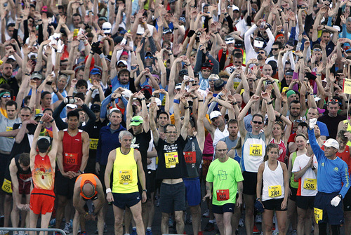 Runners stretch as they wait for the final few minutes to elapse at the start of the Salt Lake City Marathon, Saturday, April 21, 2012 at the Legacy Bridge near the University of Utah.  (AP Photo/The Salt Lake Tribune, Scott Sommerdorf)