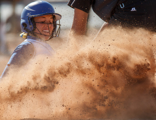 Trent Nelson  |  The Salt Lake Tribune
Taylorsville's Aubrey Kilpack slides into second as Taylorsville defeats West High School softball, Thursday April 18, 2013 in Taylorsville. West's Tryn Hunt fields the ball.