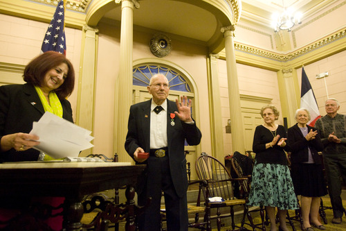 Kim Raff  |  The Salt Lake Tribune
Mike Kladis, 91, reacts to a standing ovation after be awarded the Legion of Honour, for his service in the Army liberating France during World War II, by (left) Marie-Helene Glon, of the Honorary Consul of France, at the Masonic Lodge in Salt Lake City on April 20, 2013.  This award is France's highest honor.
