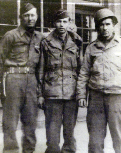 Kim Raff  |  The Salt Lake Tribune
Mike Kladis, 91, is awarded the Legion of Honour, for his service in the Army liberating France during World War II at the Masonic Lodge in Salt Lake City on April 20, 2013. Mike Kladis is pictured (middle) with other G.I.s in Paris during World War II.
