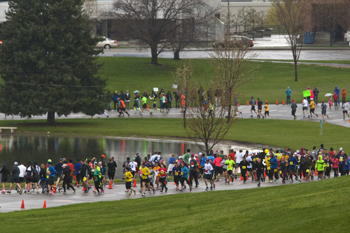 Chris Detrick  |  The Salt Lake Tribune
Runners race around Sugar House Park during the Salt Lake City marathon and half marathon Saturday April 20, 2013.