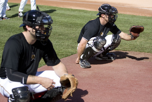 Kim Raff  |  The Salt Lake Tribune
Salt Lake Bees catchers (left) Chris Snyder and (right) John Hester warm up pitchers during the pre game work out before a game against Tacoma at Spring Mobile Ballpark in Salt Lake City on April 21, 2013.
