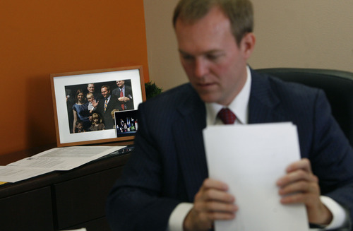 Scott Sommerdorf   |  The Salt Lake Tribune
Salt Lake County Mayor Ben McAdams at work in his office near a photo of his family, Wednesday, April 17, 2013. McAdams has completed the first 100 days of his term.