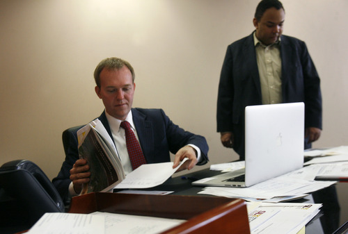 Scott Sommerdorf   |  The Salt Lake Tribune
Salt Lake County Mayor Ben McAdams at work in his office along with his executive assistant Jon Hennington, right, Wednesday, April 17, 2013. McAdams has completed the first 100 days of his term.