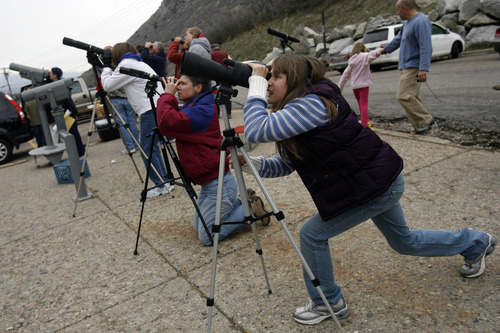 Chris Detrick | Tribune file photo
Sophie Gauthier uses a telescope to help look for mountain goats at the mouth of Little Cottonwood Canyon in 2009. The Utah Division of Wildlife Services is once again inviting the public to observe mountain goats using provided binoculars and spotting scopes. This year's viewing party is April 20, 2013.