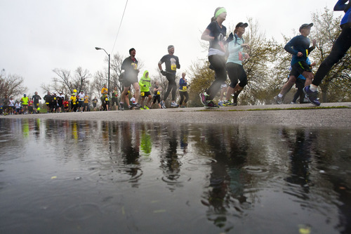 Chris Detrick  |  The Salt Lake Tribune
Runners race around Sugar House Park during the Salt Lake City marathon at the University of Utah Saturday April 20, 2013.