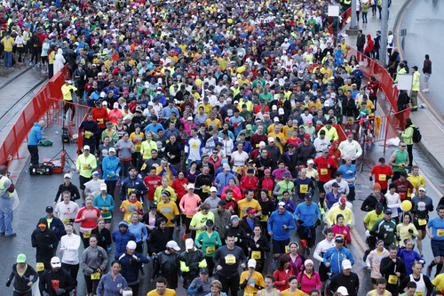 Ashley Detrick  |  The Salt Lake Tribune
Runners begin the Salt Lake Marathon to the song "Sweet Caroline" on Saturday April 20, 2013.