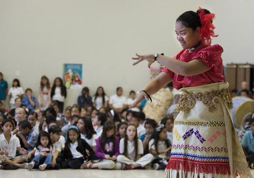 Paul Fraughton  |   Salt Lake Tribune
Siutaisa Vaitai performs the Tauolunga, a traditional Tongan dance,  as part of the festivities at The Pacific Heritage Academy's Tongan Heritage Day Celebration held at the school.