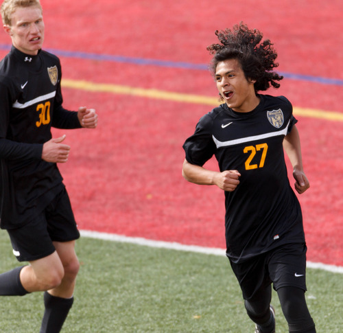 Trent Nelson  |  The Salt Lake Tribune
Wasatch's Alex Espinoza celebrates a goal as Wasatch faces Judge Memorial High School, boys soccer Wednesday April 17, 2013 in Salt Lake City. Isaac Smedley at left.
