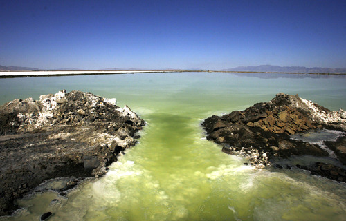 Rick Egan   |  The Salt Lake Tribune


Evaporation ponds at Great Salt Lake Minerals, on the shore of the Great Salt Lake, Thursday, September 23, 2010. GSL Minerals makes fertilizer by drawing water from the Great Salt Lake into solar evaporation ponds. Solar energy evaporates water from the ponds and yields the potassium and other minerals.