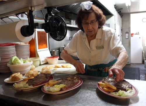 Rick Egan  | The Salt Lake Tribune 

Kitty Pappas plates waffle fries in the kitchen of her Woods Cross steak house.