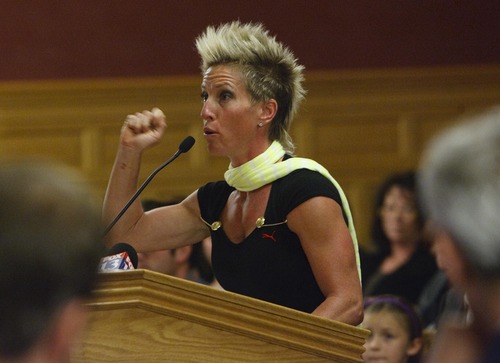 Leah Hogsten  |  The Salt Lake Tribune
Eliza James, co-owner of BIFG or Boxing Is For Girls gym in Sugar House on 11th East speaks against the measure. Sugar House residents packed City Hall by the hundreds to give their opinions to the Salt Lake City Council regarding a future extension of the Sugar House Streetcar, April 23, 2013.