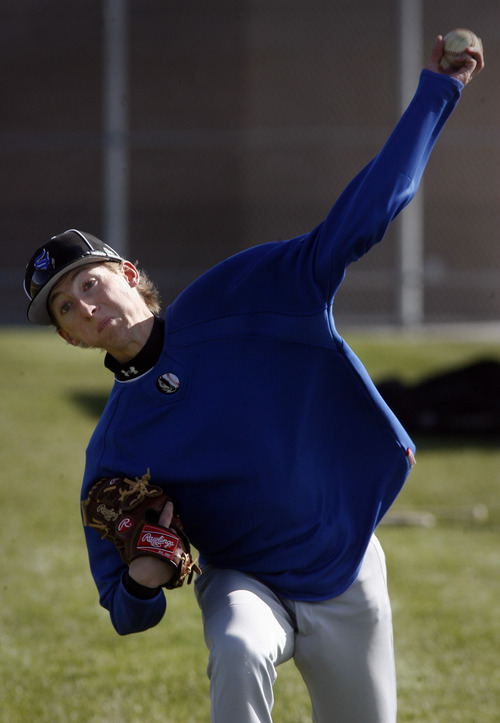 Rick Egan  | The Salt Lake Tribune 

Stansbury High school pitcher Trenton Griffin fires the ball during practice, Monday, April 22, 2013.