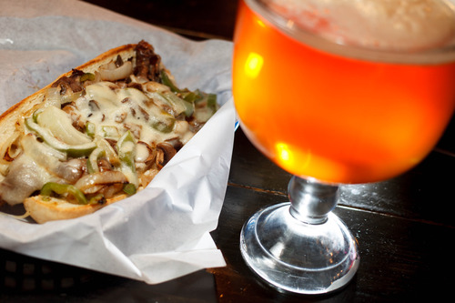 Trent Nelson  |  The Salt Lake Tribune
The Philly Cheesesteak sandwich and a schooner of beer at Spedelli's, a Salt Lake City Pizza Parlor and bar, Wednesday April 10, 2013.