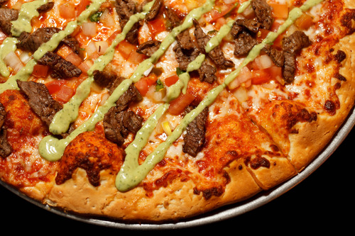 Trent Nelson  |  The Salt Lake Tribune
The carne asada pizza at Spedelli's, a Salt Lake City Pizza Parlor and bar, Wednesday April 10, 2013.