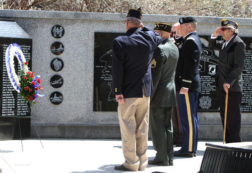 Rick Egan  | The Salt Lake Tribune 

Korean War veterans salute during the laying of the wreath ceremony at Memory Grove, Wednesday, April 24, 2013. The ceremony was part of a larger effort to remember veterans of the Korean War, which began June 25, 1950, and ended in July 1953.