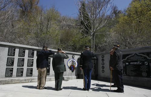 Rick Egan  | The Salt Lake Tribune 

Korean War veterans salute during the laying of the wreath ceremony at Memory Grove, Wednesday, April 24, 2013. The  ceremony was part of a larger effort to remember veterans of the Korean War, which began June 25, 1950, and ended in July 1953.