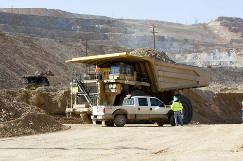 Al Hartmann  |  The Salt Lake Tribune
Heavy machinery removes debris at Kennecott on Thursday, April 25, 2013. The landslide will hinder copper production this year, which could mean lost jobs and scant supplies for customers.