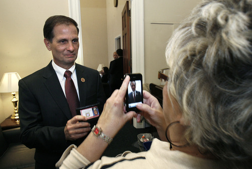 Scott Sommerdorf  |  The Salt Lake Tribune
Congressman-elect Chris Stewart, R-Utah, stops to pose for a photo by supporter Connie Smith in his Capitol office prior to Stewart's swearing-in, Thursday, Jan. 3, 2013.