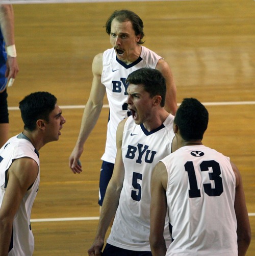 Kim Raff  |  The Salt Lake Tribune
BYU players celebrate scoring a point against UCLA during the semifinals of the MPSF Volleyball Tournament at the Smith Fieldhouse in Prove on April 25, 2013.  BYU went on to win the match 3-2 after trailing UCLA by two sets.