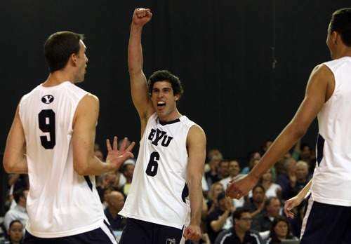 Kim Raff  |  The Salt Lake Tribune
BYU players (left) Tyler Heap and (middle) Josue Rivera celebrate scoring a point against UCLA during the semifinals of the MPSF Volleyball Tournament at the Smith Fieldhouse in Prove on April 25, 2013.  BYU went on to win the match 3-2 after trailing UCLA by two sets.