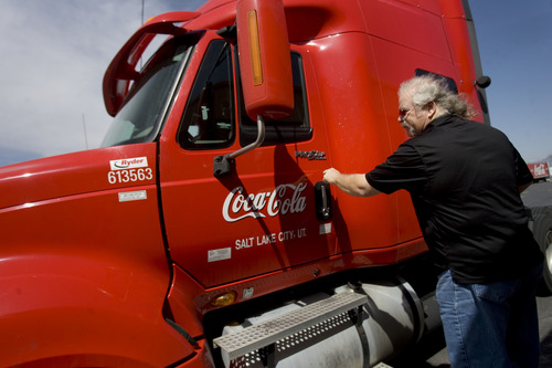 Kim Raff  |  The Salt Lake Tribune
Craig Vorwaller, a Ryder truck driver for Swire CocaCola, gets in the cab of his truck to hook up a trailer before heading out on a transport in West Valley City on April 25, 2013. Vorwaller has been recognized by Ryder for driving 3.1 million miles over his 34-year professional driving career.