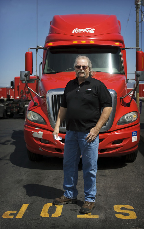 Kim Raff  |  The Salt Lake Tribune
Craig Vorwaller, a Ryder truck driver for Swire CocaCola, poses for a portrait in front of his truck in West Valley City on April 25, 2013. Vorwaller has been recognized by Ryder for driving 3.1 million miles over his 34-year professional driving career.