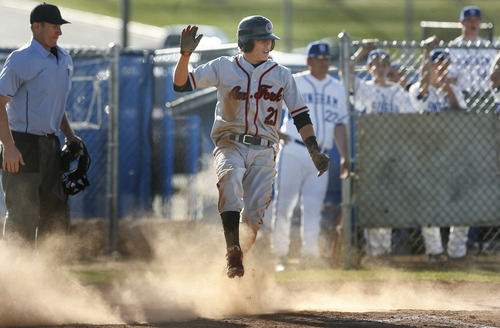 Scott Sommerdorf   |  The Salt Lake Tribune
American Fork's Sean Hardman pops up to celebrate scoring a run to put American Fork up 5-4 in the toip of the 8th. American Fork held on in the bottom of the inning and defeated Bingham 8-7 in eight innings at Bingham, Friday, April 26, 2013.